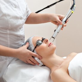Laser skin rejuvenation uses healing light energy to promote collagen production, which helps tighten skin, reduce wrinkles, and improve skin flaws.